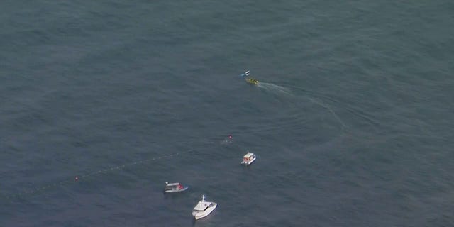 Rescuers are at work off the Gold Coast of Australia.