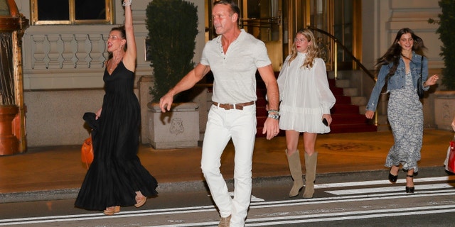 Faith Hill and Tim McGraw and their daughters Maggie (left) and Audrey (right) during their weekend festivities.