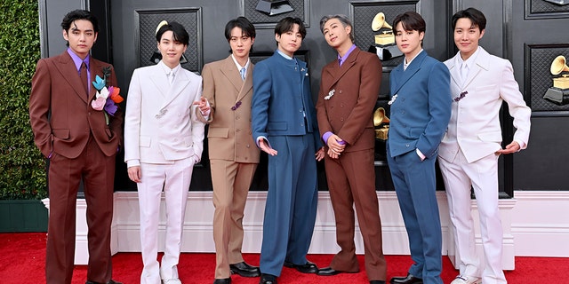 V, Suga, Jin, Jungkook, RM, Jimin and J-Hope of BTS attends the 64th Annual GRAMMY Awards at MGM Grand Garden Arena on April 03, 2022, in Las Vegas, Nevada. 