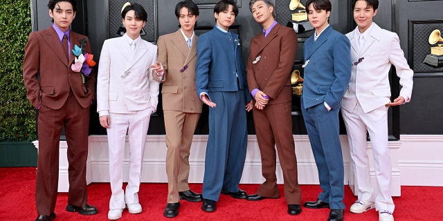 V, Suga, Jin, Jungkook, RM, Jimin and J-Hope of BTS attends the 64th Annual GRAMMY Awards at MGM Grand Garden Arena on April 03, 2022, in Las Vegas, Nevada. 