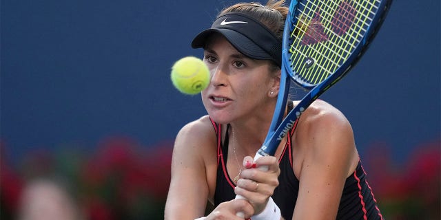 Belinda Bencic returns to Serena Williams at the National Bank Open tennis tournament on August 10, 2022 in Toronto.