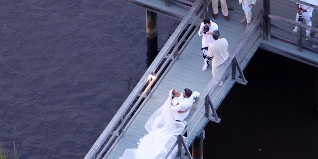 Ben Affleck and Jennifer Lopez kissed on a dock during their second wedding ceremony in Georgia.