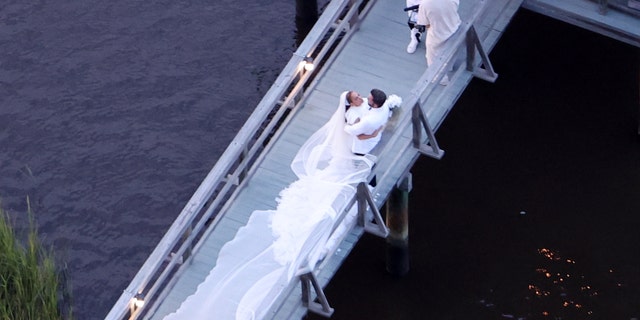 Ben Affleck and Jennifer Lopez kissed on a dock during their second wedding ceremony in Georgia.