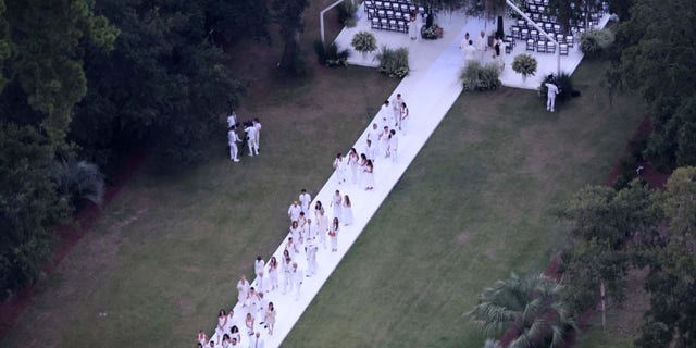 Ben Affleck and Jennifer Lopez hosted an intimate wedding with guests dressed in white for a celebration on their 87-acre Georgia estate.