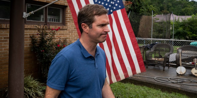 WHITESBURG, KY - JULY 31: Kentucky Governor Andy Beshear visits a house with flood damage in the city on July 31, 2022 in Whitesburg, Kentucky.