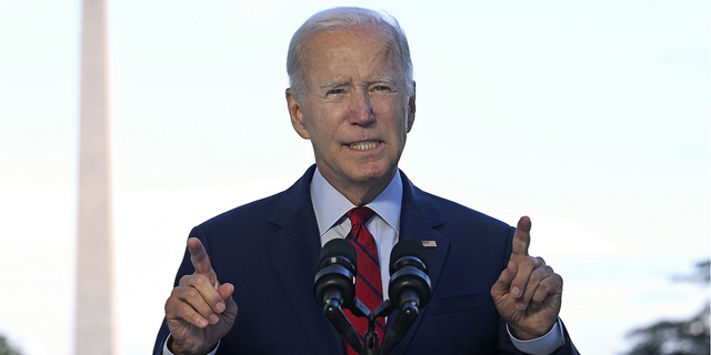 President Biden speaks from the Blue Room Balcony of the White House in Washington on Monday, Aug. 1, 2022.