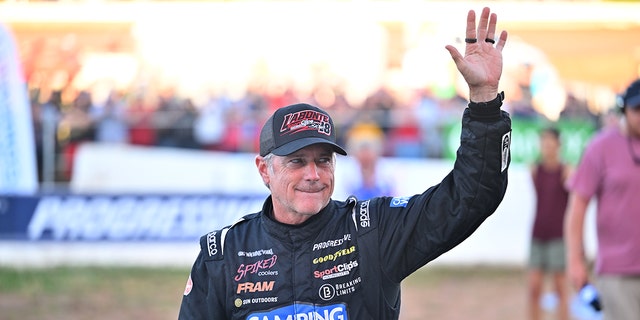 Bobby Labonte waves to the crowd prior to the SRX qualifying race at Sharon Speedway on July 23, 2022, in Hartford, Ohio.