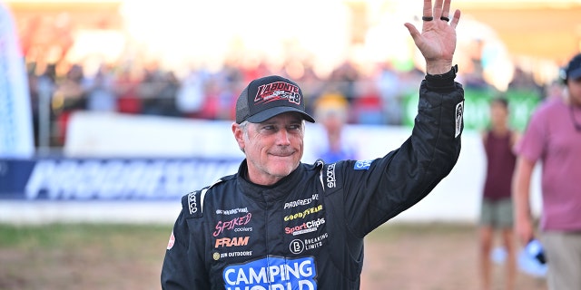 Bobby Labonte waves to the crowd before the SRX Qualifying Race at Sharon Speedway in Hartford, Ohio on July 23, 2022.