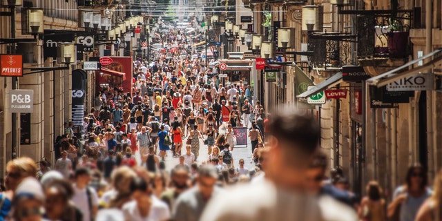 This summer, 35 million French people went on vacation. Pedestrians are shown on Bordeaux, France's Rue Sainte-Catherine. This street is one of the longest shopping streets in Europe.