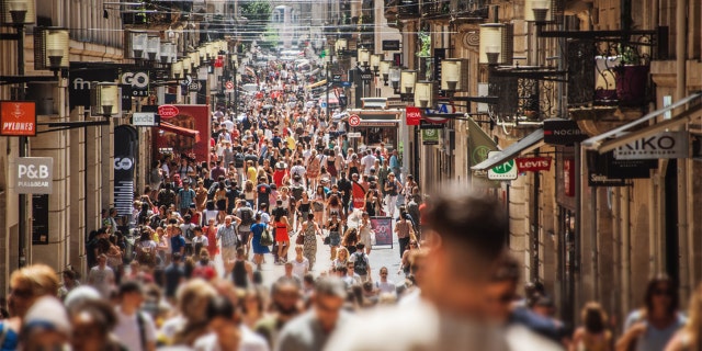 This summer, 35 million French people went on vacation. Pedestrians are shown on Bordeaux, France's Rue Sainte-Catherine. This street is one of the longest shopping streets in Europe.