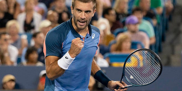 Borna Coric reacts to a point against Rafael Nadal during the Western &amp; Southern Open at the Lindner Family Tennis Center in Cincinnati August 17, 2022.