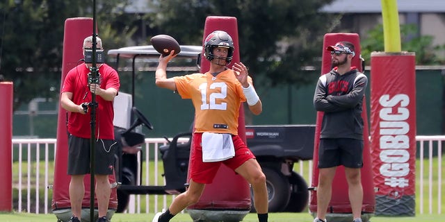 Tampa Bay Buccaneers quarterback Tom Brady throws a pass during training camp Aug. 22, 2022, at the AdventHealth Training Center at One Buccaneer Place in Tampa, Fla.