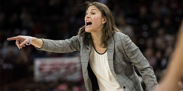 UNC Asheville head coach Brenda Mock Kirkpatrick gestures during a first-round game against South Carolina in the women's NCAA college basketball tournament Friday, March 17, 2017, in Columbia, S.C. East Tennessee State hired Brenda Mock Brown as the Buccaneers' new women's basketball coach Monday, Aug. 8, 2022, one week after announcing Simon Harris was being fired over Title IX issues in his lone season. Interim athletic director Richard Sander announced the hiring at a news conference. 