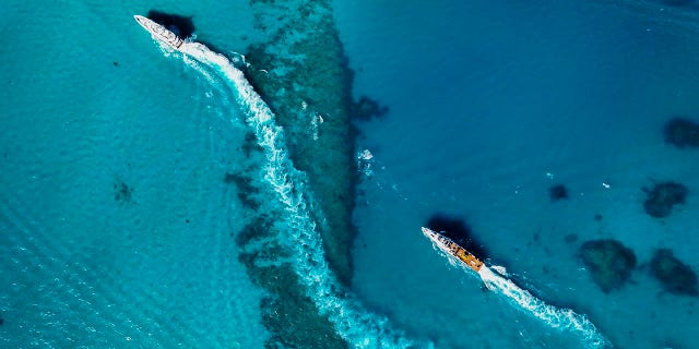 An Allen Exploration fleet is shown in the waters of the Bahamas.