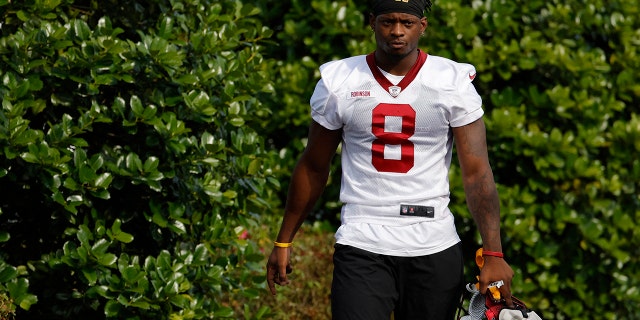 Washington Commanders running back Brian Robinson walks to the field during training camp in Ashburn, Virginia, July 28, 2022.