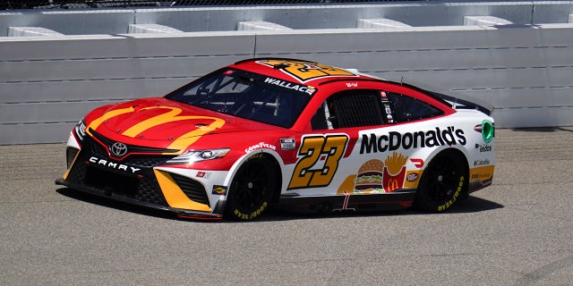 Bubba Wallace drives during qualifying at the Michigan International Speedway in Brooklyn, Michigan, on Aug. 6, 2022. Wallace won the pole position.