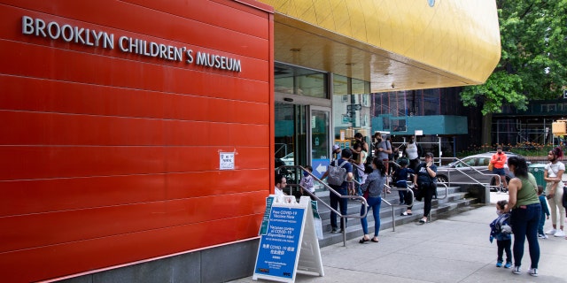 Children line up to receive the Covid-19 vaccine for children aged 6 months to 5 years at the Immunization Site at the Children's Museum of Brooklyn in Brooklyn, New York, Thursday, June 23, 2022. 