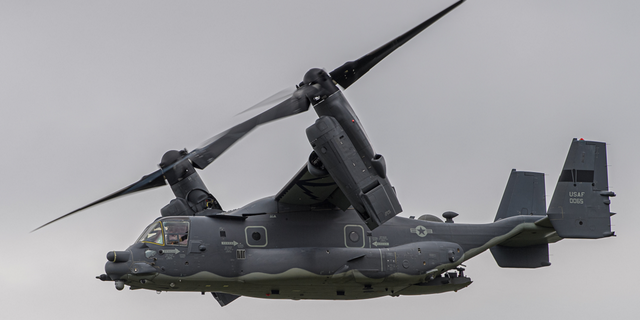 A U.S. Air Force Bell Boeing CV-22 Osprey tiltrotor military aircraft takes off for an evening training flight from RAF Mildenhall in Suffolk, England, in July 2020.