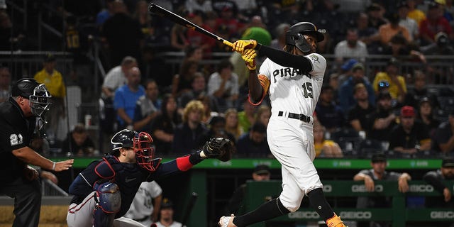 Oneil Cruz (15) of the Pittsburgh Pirates hits a solo home run in the fifth inning during a game against the Atlanta Braves at PNC Park Aug. 22, 2022, in Pittsburgh.