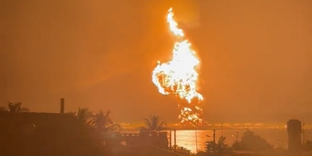 A fireball rises into the sky after an explosion at the Matanzas supertanker base in Cuba.