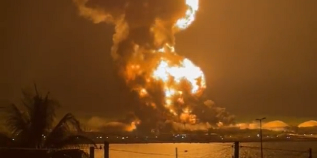 The explosion sent smoke into the atmosphere, turning it orange.
