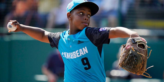 Curacao's Shemar Jacobus delivers in the first inning of the Little League World Series championship game against Honolulu in South Williamsport, Pennsylvania, on Aug. 28, 2022.