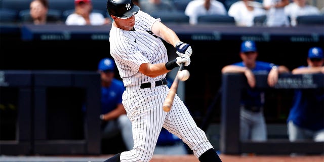 New York Yankees' DJ LeMahieu hits a home run against the Kansas City Royals during the fifth inning of a baseball game Sunday, July 31, 2022, in New York.