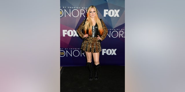 Avril Lavigne rocked an edgy spiked leather jacket.