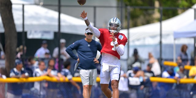 Dak Prescott #4 of the Dallas Cowboys throws a pass during training at River Ridge Fields on August 1, 2022 in Oxnard, California.