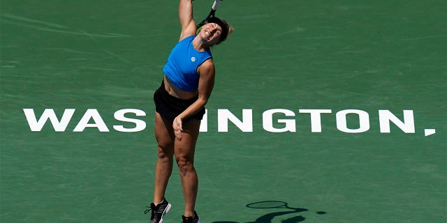 Daria Saville, of Australia, serves during a match against Jessica Pegula, of the United States, at the Citi Open tennis tournament in Washington, Wednesday, Aug. 3, 2022.