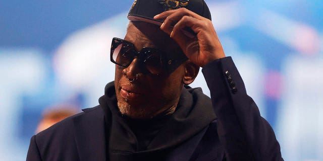 Dennis Rodman reacts after being introduced as part of the NBA 75th Anniversary Team during the 2022 NBA All-Star Game at Rocket Mortgage Fieldhouse in Cleveland, Ohio, on February 20, 2022.