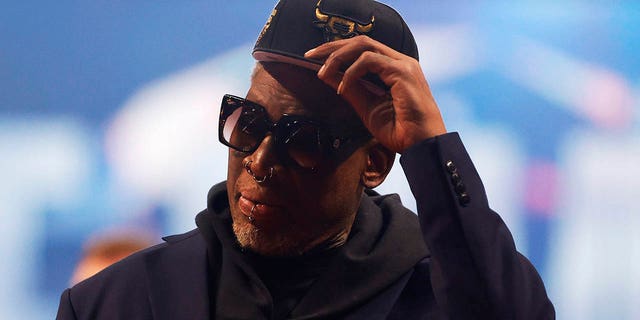 Dennis Rodman reacts after being introduced as part of the NBA 75th Anniversary Team during the 2022 NBA All-Star Game at Rocket Mortgage Fieldhouse in Cleveland, Ohio, on February 20, 2022.