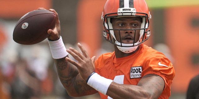 Cleveland Browns quarterback Deshaun Watson, #4, throws a pass during training camp at CrossCountry Mortgage Campus in Berea, Ohio July 28, 2022.