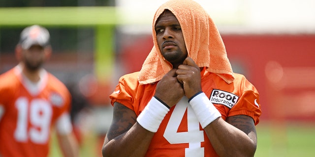 Cleveland Browns quarterback Deshaun Watson looks at him during training camp at CrossCountry Mortgage Campus in Berea, Ohio, on July 28, 2022.