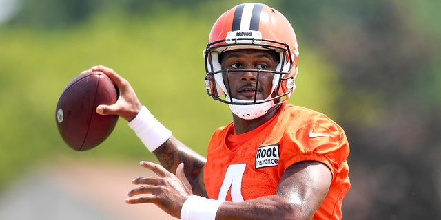 Cleveland Browns quarterback Deshawn Watson prepares to throw a pass during training camp Aug. 1, 2022 in Bellaire, Ohio.