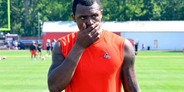 Cleveland Browns quarterback Deshaun Watson walks off the field after training camp Aug. 3, 2022, in Berea, Ohio.