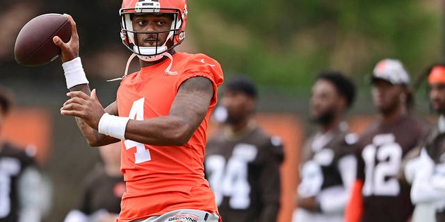 Cleveland Browns quarterback Deshaun Watson throws during an NFL football practice in Berea, Ohio, Sunday, August 14, 2022.