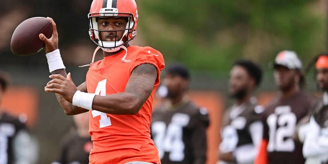Cleveland Browns quarterback Deshaun Watson throws during an NFL football practice in Berea, Ohio, Sunday, August 14, 2022.