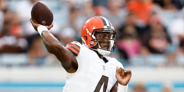 Cleveland Browns quarterback Deshaun Watson, #4, looks to throw the ball during the first quarter of a preseason game against the Jacksonville Jaguars at TIAA Bank Field on August 12, 2022 in Jacksonville, Florida.