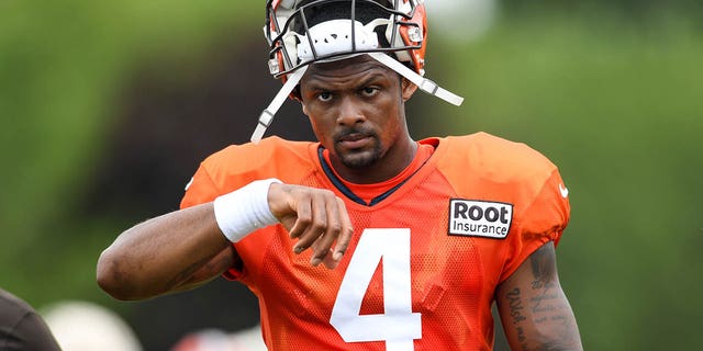 Deshaun Watson of the Cleveland Browns walks off the field during Cleveland Browns training camp at CrossCountry Mortgage Campus Aug. 9, 2022, in Berea, Ohio.