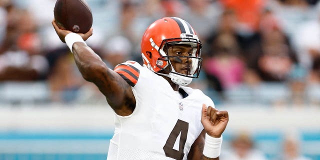 Cleveland Browns quarterback Deshaun Watson looks to throw during the first quarter of a preseason game against the Jacksonville Jaguars at TIAA Bank Field in Jacksonville, Fla., Aug. 12, 2022.