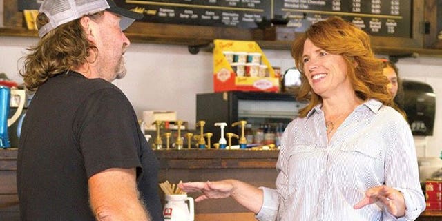 Oregon GOP gubernatorial candidate Christine Drazan speaks with a supporter at a campaign stop.