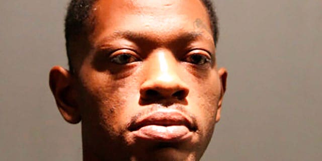 This photo provided by the Chicago Police Department shows Tavis Dunbar.