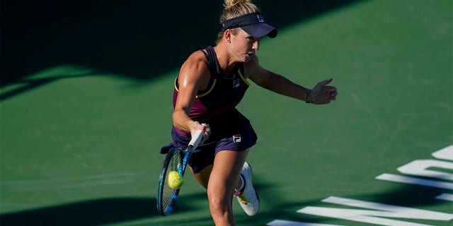 Elizabeth Mandlik, of the United States, returns a shot to Paula Badosa, of Spain, at the Mubadala Silicon Valley Classic tennis tournament in San Jose, Calif., Wednesday, Aug. 3, 2022. Badosa won 6-2, 5-7, 7-6 (5).
