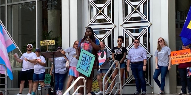 Shea Cutliff, of RISE Coalition, during a rally against a proposed ban against gender-affirming care for transgender children and teens on July 31, 2022, at Orlando City Hall in Florida.