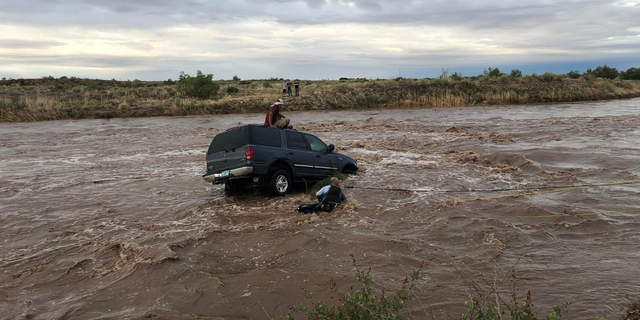 The driver became stranded after attempting to cross the Felix River outside of Roswell.