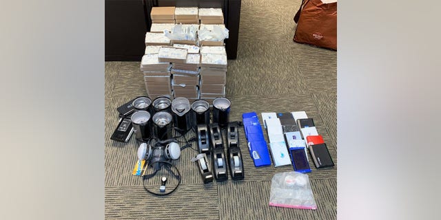 Heroin/Fentanyl packaging and other drug-related paraphernalia.