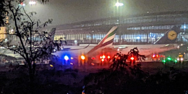 A flight from New Jersey to Germany was diverted to Boston's Logan Airport after the cockpit filled with smoke.