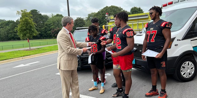 The Rome High School football players were given an award for their heroic actions.