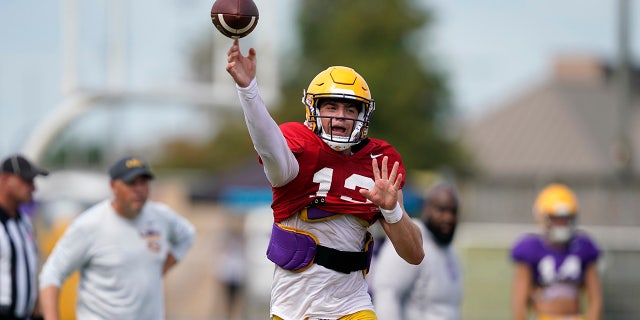 LSU quarterback Garrett Nussmeier (13) throws a pass during NCAA college football practice in Baton Rouge, La., Wednesday, Aug. 17, 2022.